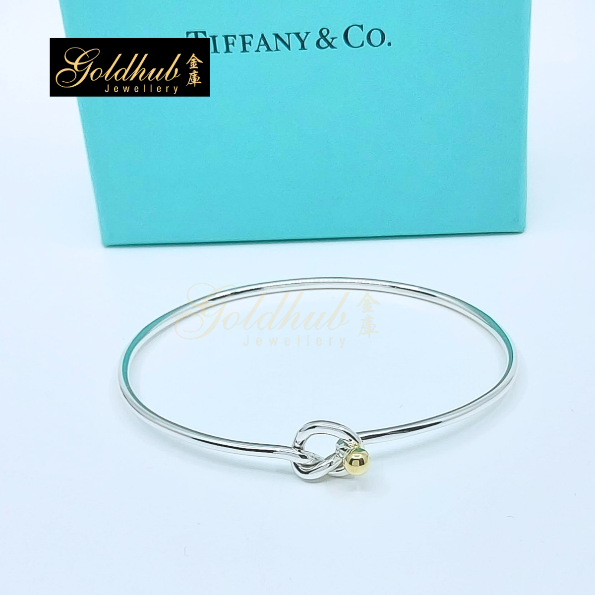 Tiffany & Co. Love Knot Bangle in Silver and Yellow Gold