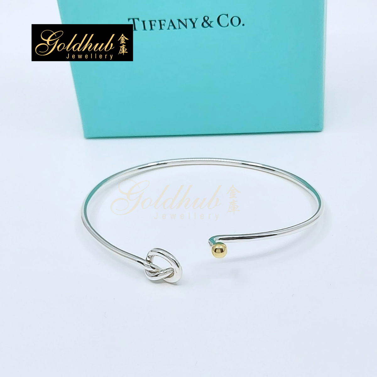 Tiffany & Co. Love Knot Bangle in Silver and Yellow Gold