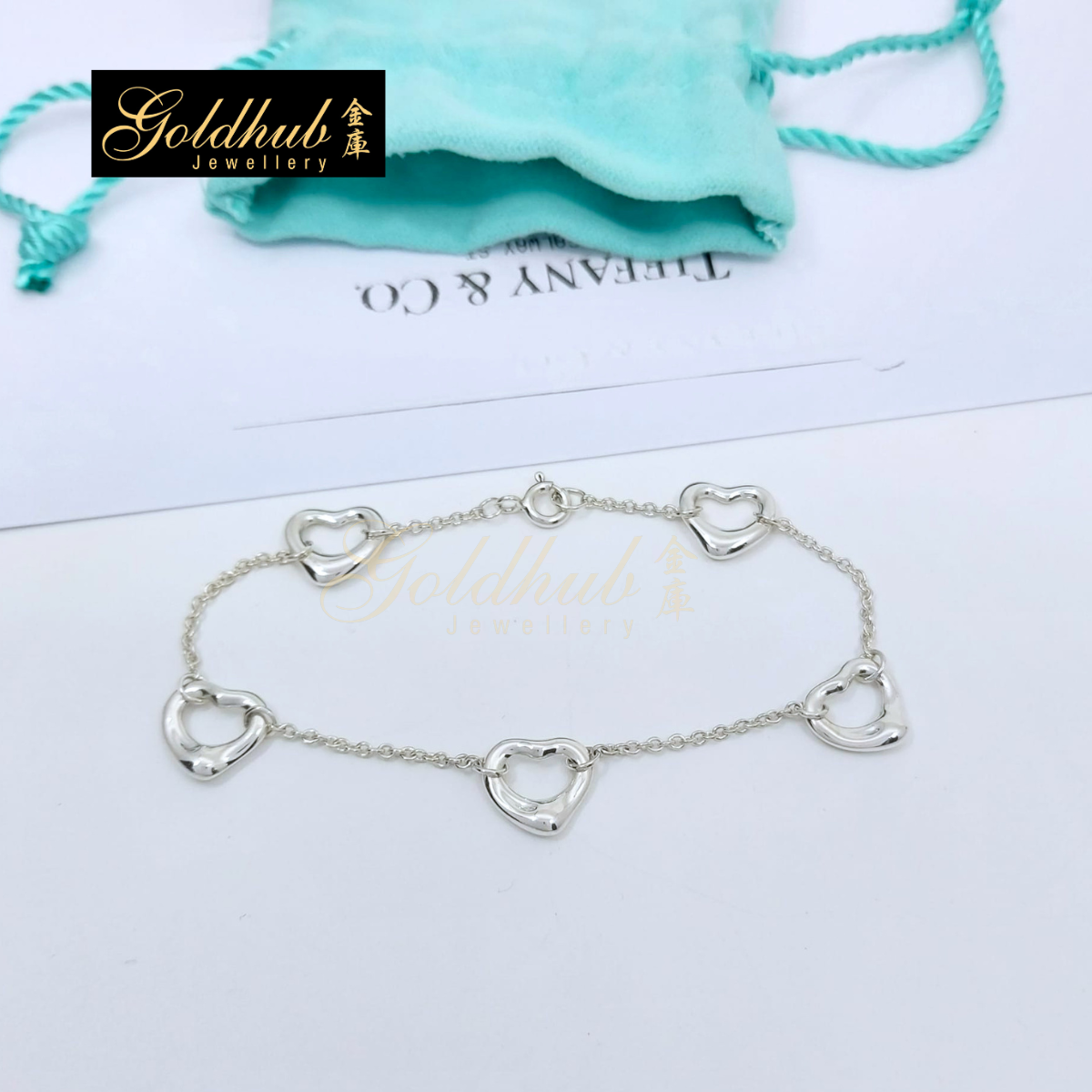 Tiffany & Co Elsa Peretti Five Open Hearts Bracelet in Silver, Size Medium