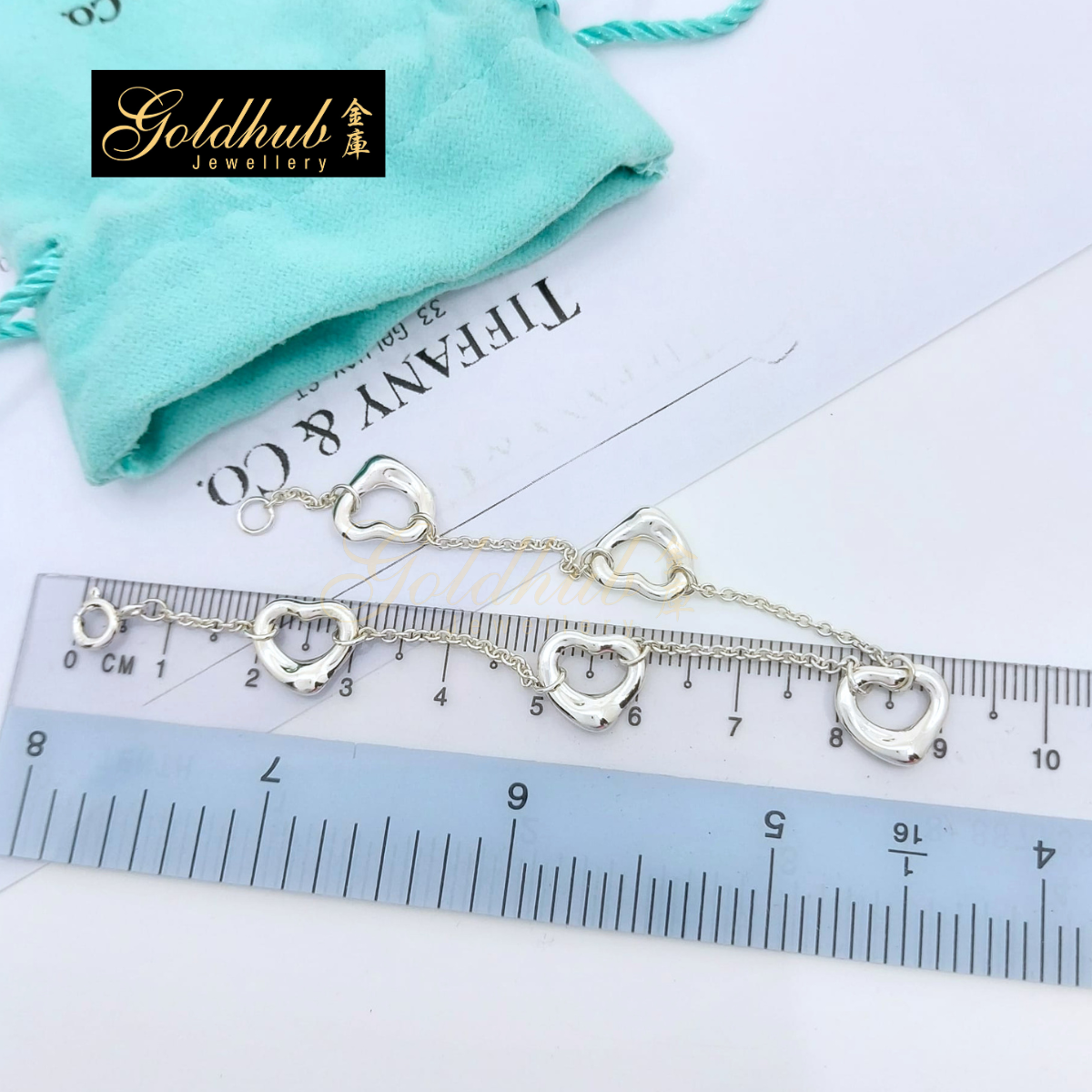 Tiffany & Co Elsa Peretti Five Open Hearts Bracelet in Silver, Size Medium