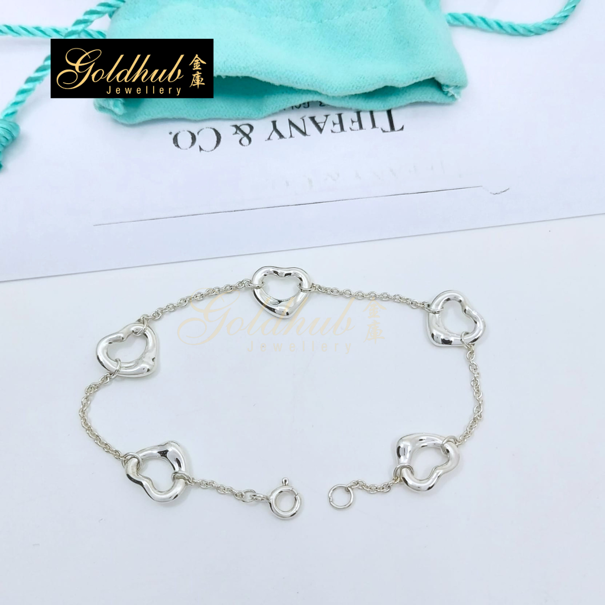 Tiffany & Co Elsa Peretti Five Open Hearts Bracelet in Silver, Size Medium
