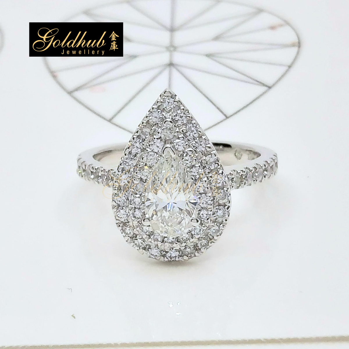0.76ct Pear Diamond Halo Ring in Platinum