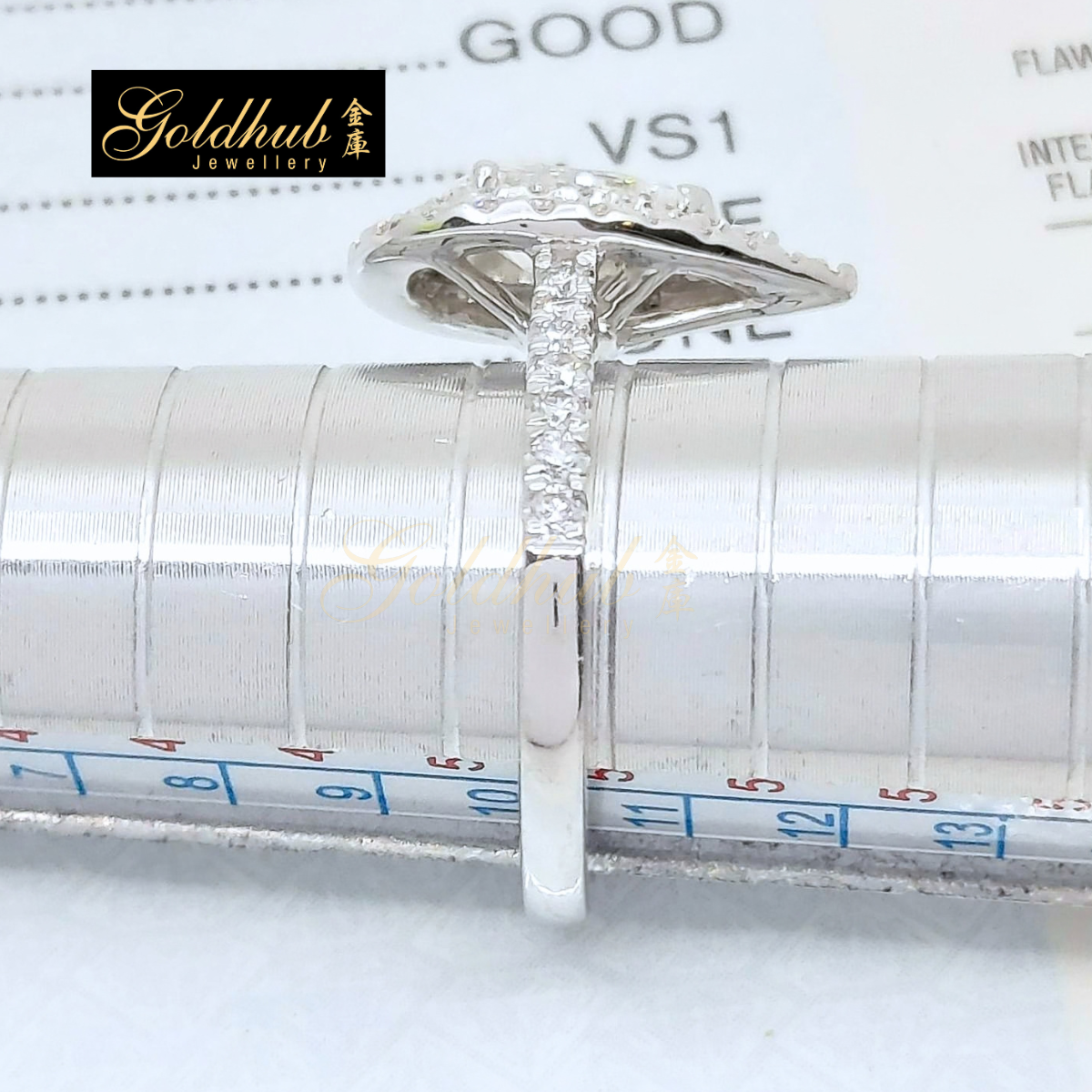 0.76ct Pear Diamond Halo Ring in Platinum